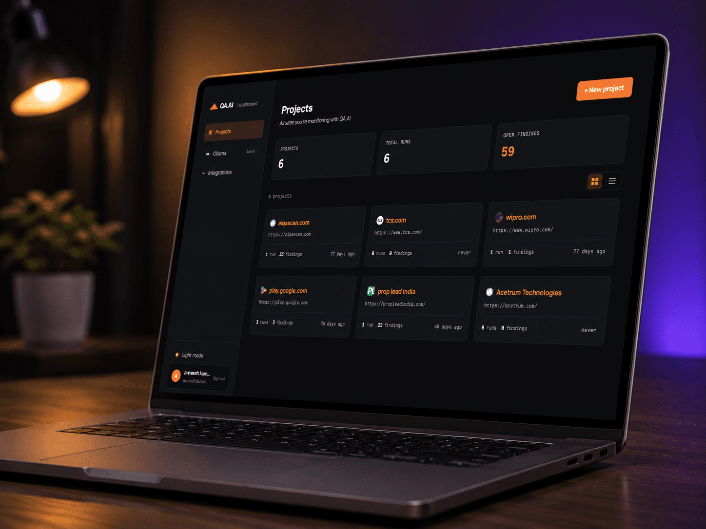 QA.AI dashboard — monitored projects with scan runs and open findings