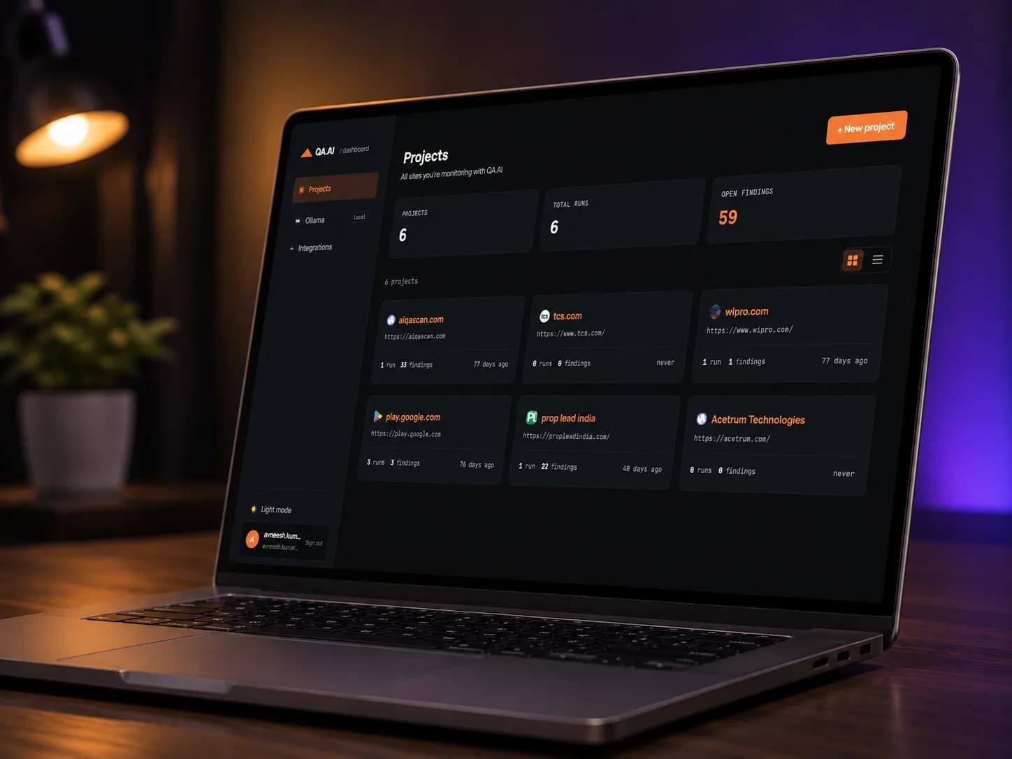 QA.AI dashboard — monitored projects with scan runs and open findings